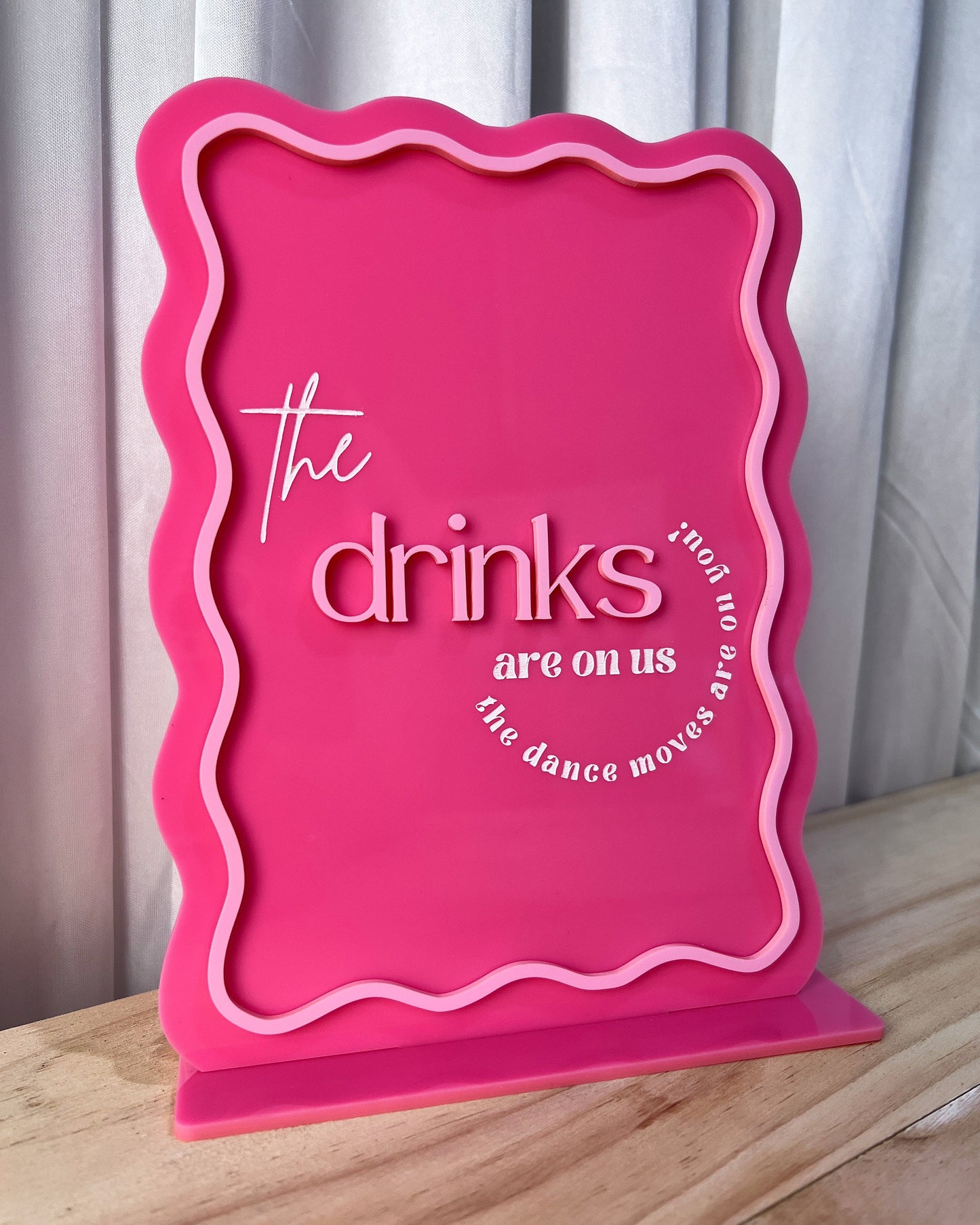 The Drinks are on us Sign