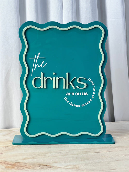 The Drinks are on us Sign